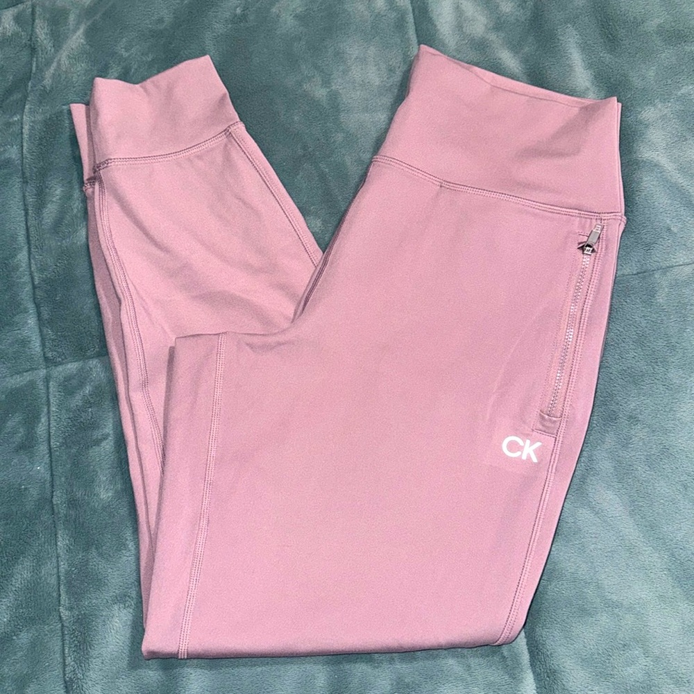 Calvin Klein pinkish leggings.